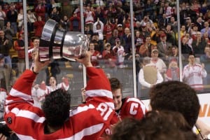 Brandon Yip hoists the trophy for the BU fans to see. Peter Keeling for Blast Magazine