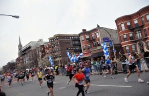 Runners pass St. Mary's Street on the last leg of the Boston Marathon. (Blast Magazine staff photo/Sarah Gordon)