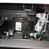Your cabin air filter is in the rectangle above the cylinder marked "Toyota." Push the tabs, and the cover comes right off. Your cabin air filter is in the rectangle above the cylinder marked "Toyota." Push the tabs, and the cover comes right off.