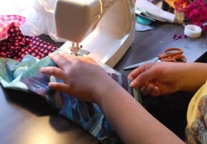 Tan sews not just his drag costumes, but also clothes that he sells on his Etsy (craft sales) website.  Tan taught himself to sew, he said, on the machine his mother kept at home. (Blast staff photo/Adam J. Sell)