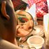 The foundation for Tan's "paint", or drag makeup, is a specially-formulated cosmetic designed for sufferers of skin ailments. Dermablend, Tan says, has two markets - burn victims and drag queens. (Blast Staff photo/Adam J. Sell)