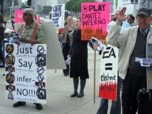Protesters demonstrate against Dante's Inferno, a fighting game under development by Electronic Arts. (Blast Magazine staff photo/John M. Guilfoil)