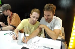 Actors Seth Green and Breckin Meyer attend a Robot Chicken Signing
