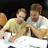 Actors Seth Green and Breckin Meyer attend a Robot Chicken Signing