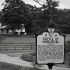 One of the many placards alerting of a battle along a drive