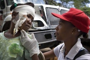 Another Red Cross volunteer tending to a child