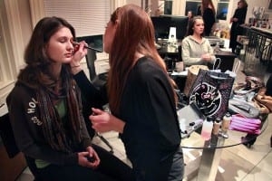 Glam Squad at Safar Salon: Makeup artist Jessica Taylor styles glam doll Morgan Furber of Natick. Tonight was Furber's first shoot as a glam doll. (Blast staff photo/Steve Klise)