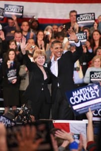 President Barack Obama and Massachusetts State Attorney General and Senate candidate Martha Coakley wave to the crowd at the end of the rally. (Steve Klise for Blast Magazine)