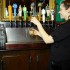 You DO tilt the glass when you pour. (Blast staff photo/Steve Osemwenkhae)