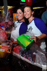 Volunteers preparing the first of 80 raffle items up for grabs that night.
