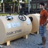 Matthew Mazzotta, armed with a $4,000 grant from the Massachusetts Institute of Technology, created the ingenious Park Spark converter system that uses dog poop to power a gas lantern that illuminates a corner of the Pacific Street Dog Park in Cambridge, Massachusetts. Pictured: A local resident admires Mazzotta's handiwork . (Media credit/Luke Ryan via Flickr) Matthew Mazzotta, armed with a $4,000 grant from the Massachusetts Institute of Technology, created the ingenious Park Spark converter system that uses dog poop to power a gas lantern that illuminates a corner of the Pacific Street Dog Park in Cambridge, Massachusetts. Pictured: A local resident admires Mazzotta's handiwork . (Media credit/Luke Ryan via Flickr)