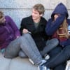 Tangled together for warmth, local college students Ev Dimming, Brian Foote and Lindsay Cole wait outside the Hynes Convention Center to hear Barack Obama campaign for Deval Patrick. (John Stephen Dwyer for Blast Magazine) Tangled together for warmth, local college students Ev Dimming, Brian Foote and Lindsay Cole wait outside the Hynes Convention Center to hear Barack Obama campaign for Deval Patrick. (John Stephen Dwyer for Blast Magazine)