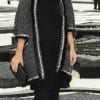 Lily Allen attends the Chanel Ready to Wear Spring/Summer 2011 show during Paris Fashion Week at Grand Palais on October 5 in Paris Lily Allen attends the Chanel Ready to Wear Spring/Summer 2011 show during Paris Fashion Week at Grand Palais on October 5 in Paris