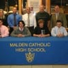 Will Guinee, Mike Vecchione, Tyler McVicar and Paul Yanakopulos seen here with Director of Guidance Cindy Jacobs, Assistant Principal Jeff Smith, Athletic Director and Head Coach Varsity Hockey Chris Serino, Head Coach Varsity Baseball Steve Freker and Principal Br. Thomas Puccio, CFX, Ed.D (Courtesy of Malden Catholic High School)