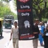 The December 1984 Union Carbide chemical spill in Bhopal, India killed 2,259 people immediately and caused lifelong health problems and premature death for tens of thousands more. Pictured: Survivors and their kin march from Bhopal to Delhi in 2006 demanding completion of the cleaning of the factory site to stop toxic chemicals from continuing to poison ground water. (Media credit/Joe Athialy via Flickr)
