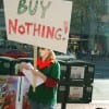 William Rees of the University of British Columbia reports that human society is in a “global overshoot,” consuming 30 percent more material than is sustainable from the world’s resources. Pictured: A "Buy Nothing Day" activist leaflets in San Francisco. (Media credit/Steve Rhodes)