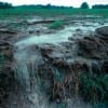 Nonpoint source pollution comes from many diffuse sources, but in the aggregate creates a formidable challenge for municipal, state and federal environmental and water control authorities -- and is likely the largest threat to our water quality. Pictured: Runoff of fertilizer-laced soil from a farm. (USDA) Nonpoint source pollution comes from many diffuse sources, but in the aggregate creates a formidable challenge for municipal, state and federal environmental and water control authorities -- and is likely the largest threat to our water quality. Pictured: Runoff of fertilizer-laced soil from a farm. (USDA)