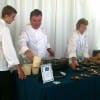 Chef Peter Kelly, of Xaviars Restaurant Group, prepares grilled corn cakes with smoked salmon.