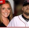 (TMZ)