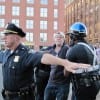 A protester is arrested during the bridge rally (Blast staff photo/John Stephen Dwyer)