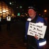 With tense anticipation in the air, Bill the Medic lightened the mood of both police and protestors with a hand-made sign (Blast Staff photo/John Stephen Dwyer) With tense anticipation in the air, Bill the Medic lightened the mood of both police and protestors with a hand-made sign (Blast Staff photo/John Stephen Dwyer)