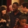 Jess (Zooey Deschanel) and Winston (Lamorne Morris) are disturbed by Nick's (Jake Johnson) behavior.