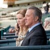 Ace Bernstein (Dustin Hoffman) watches his horse, Pint of Plain make his debut with Claire (Joan Allen).