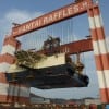 Finding significant off-shore oil reserves could turn Cuba into an oil exporter, possibly even thawing relations with a still oil-hungry U.S. Pictured: The Scarabeo 9 oil rig while still under construction in China in 2009. It is now 30 miles off of Cuba's coast and just 60 miles south of the Florida Keys. (Wikipedia)