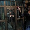 The Evil Queen (Lana Parilla) teases Charming (Josh Dallas) by showing him her secret weapon: a poisoned apple.