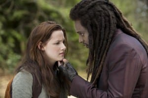 Laurent (Edi Gathegi) threatens Bella (Kristen Stewart) before the werewolves come and rescue her