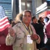 Milagros Vazquez drove up from Providence. Vasquez, who came to the US from Dominican Republic in 1980, sees Obama and Patrick as people to be emulated. 'It's an example of the American Dream,' she said as she waved her flag, 'You can be a minority, but if you work hard you will succeed.'