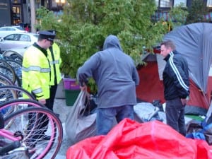 Police combed through the tend of an alleged drug dealer at Occupy Boston (Blast Staff photo/John Stephen Dwyer)