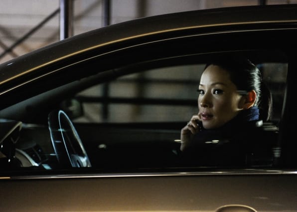 Watson (Lucy Liu) stakes out at her first case alone. 