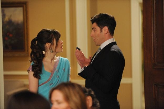Jess (Zooey Deschanel) learns of Schmidt's (Max Greenfield) plans to ruin the wedding. 