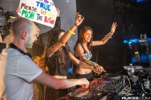 Fan pushing the button with Above and Beyond at the Wicked Halloween show.