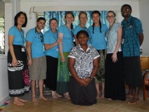 Left to right: Dr. Patricia Wu, Dr. Louis Aprile, June Osborne, Emily Poiser, Stephanie Hackett, Emma Lewis, Sarah Osborne, Dr. Ilikini Natini, and a nurse. Sea Mercy volunteers being greeted in the doctors home before setting up their first clinic on Lomaloma. 